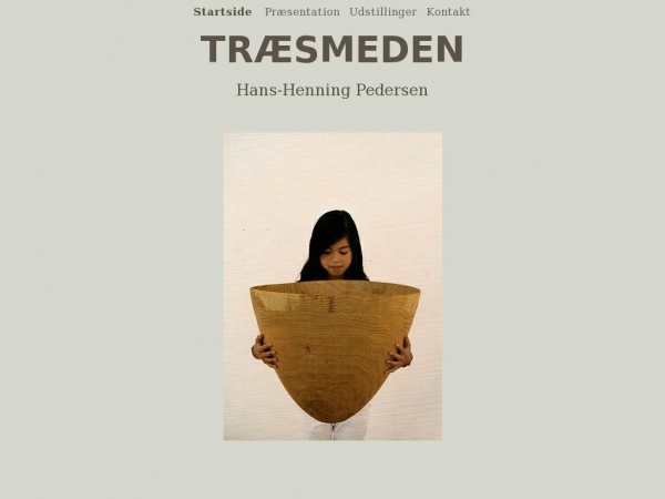 traesmedengudhjem.dk